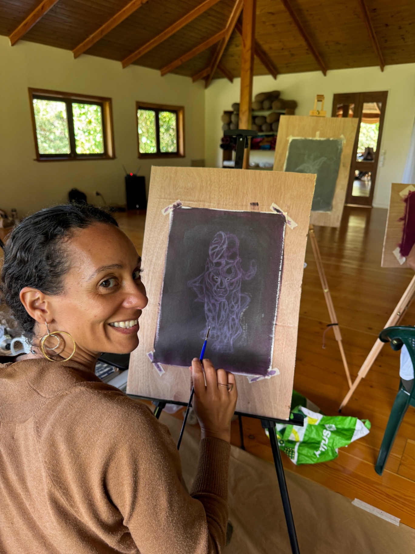 Participant with her jaguar underpainting