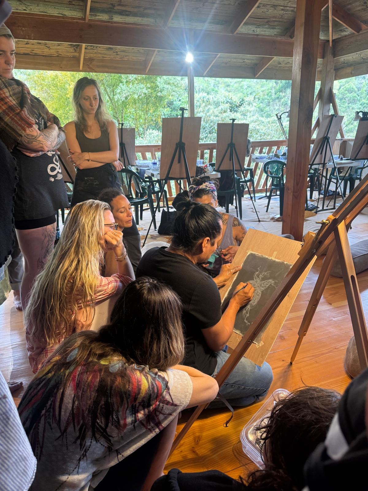 Luis Tamani demonstrating underpainting technique